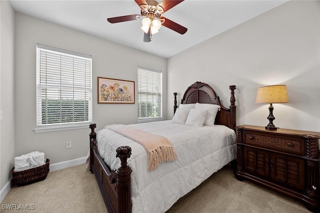 14151 Nautica Ct, Naples, FL 34114 - carpeted bedroom with ceiling fan and baseboards