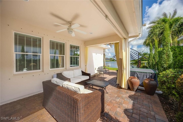 14151 Nautica Ct, Naples, FL 34114 - view of patio / terrace featuring an outdoor hangout area, a jacuzzi, and a ceiling fan
