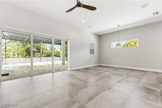 spare room with ceiling fan