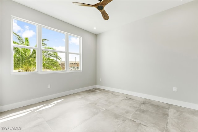 spare room with ceiling fan