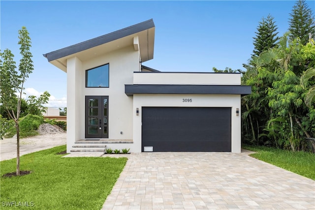 contemporary home with a front yard