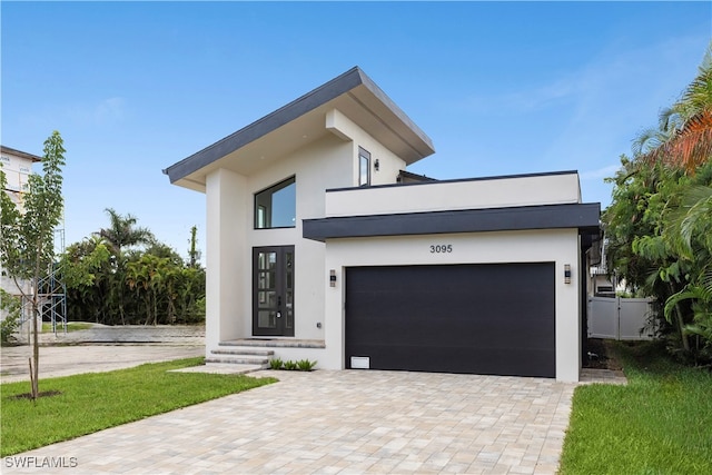 contemporary home with a garage