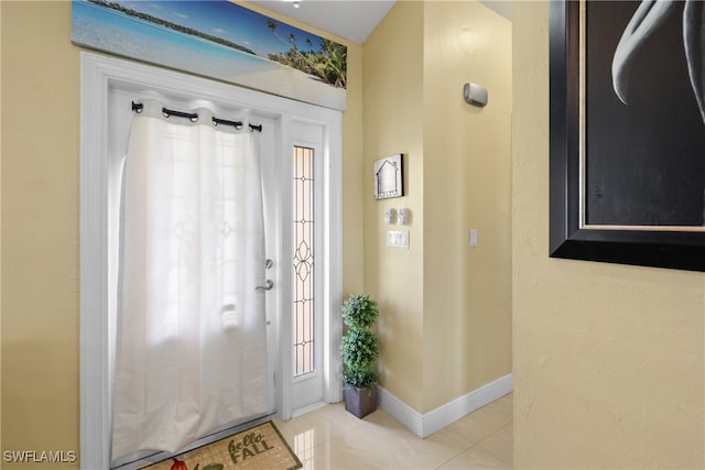 view of tiled foyer entrance