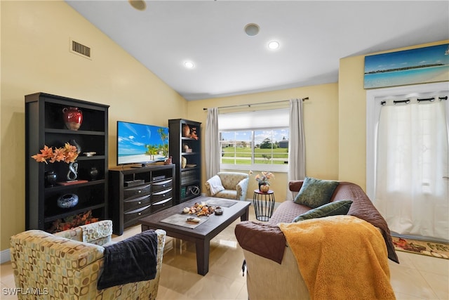 living room featuring light tile patterned flooring and lofted ceiling