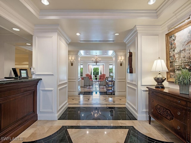 interior space featuring a notable chandelier and crown molding