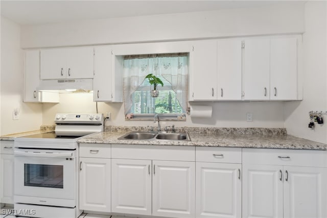 kitchen with white cabinetry, sink, and white electric range oven