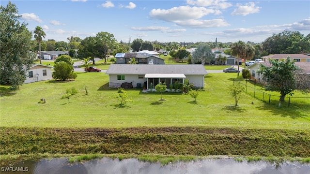 drone / aerial view with a water view