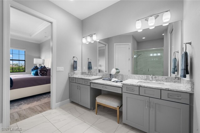 bathroom featuring vanity, walk in shower, and ornamental molding