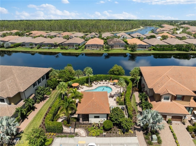 aerial view with a water view and a residential view