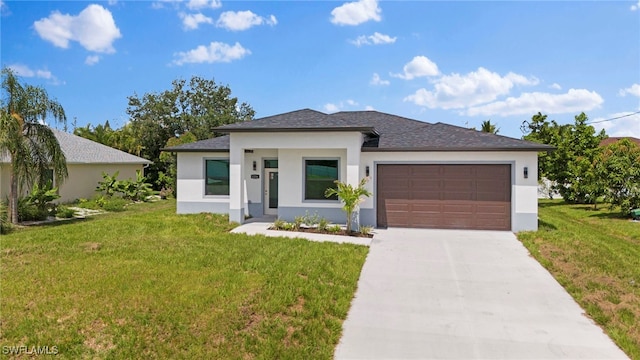 prairie-style house with a front yard and a garage