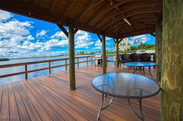 4835 Bonita Beach Rd Unit 408, Bonita Springs, FL 34134 - dock area featuring a deck with water view