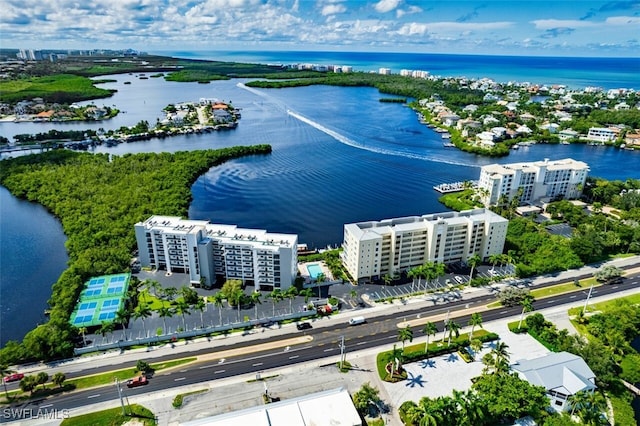 4835 Bonita Beach Rd Unit 408, Bonita Springs, FL 34134 - drone / aerial view featuring a water view and a city view