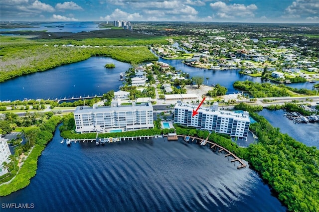 drone / aerial view with a water view