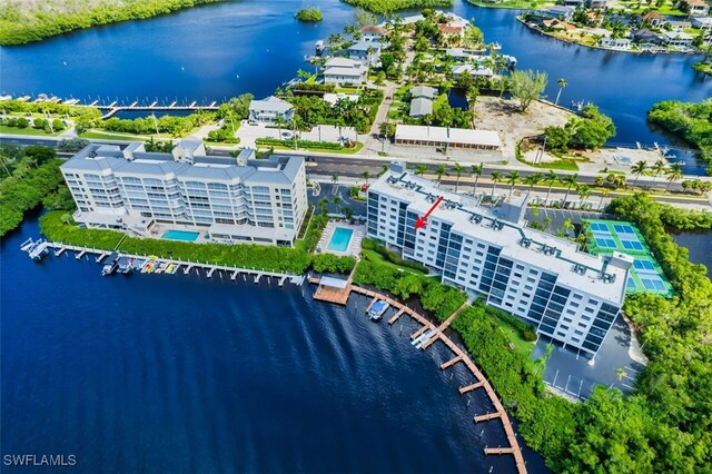 birds eye view of property featuring a water view