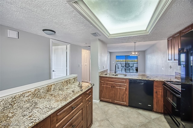 4835 Bonita Beach Rd Unit 408, Bonita Springs, FL 34134 - kitchen featuring visible vents, a sink, a textured ceiling, and black appliances