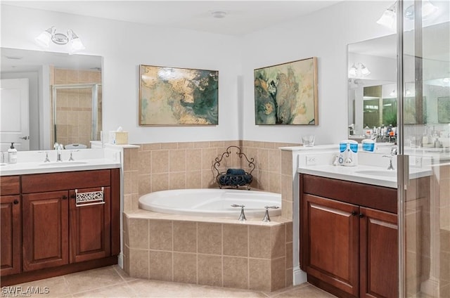 bathroom with vanity, plus walk in shower, and tile patterned floors