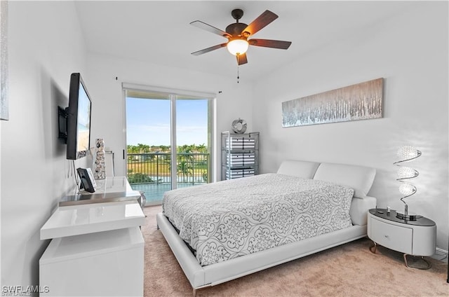 bedroom with ceiling fan, carpet floors, and access to outside