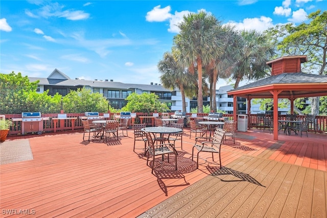 wooden terrace with a gazebo