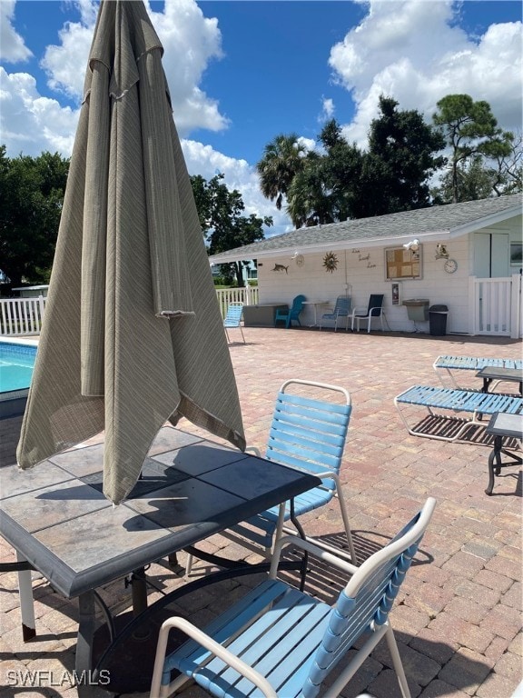 view of patio / terrace featuring a community pool