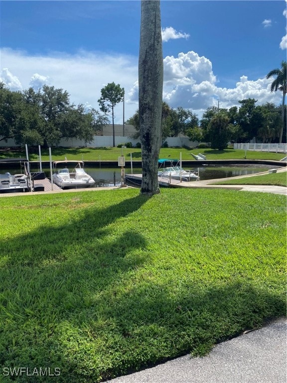 view of yard with a water view