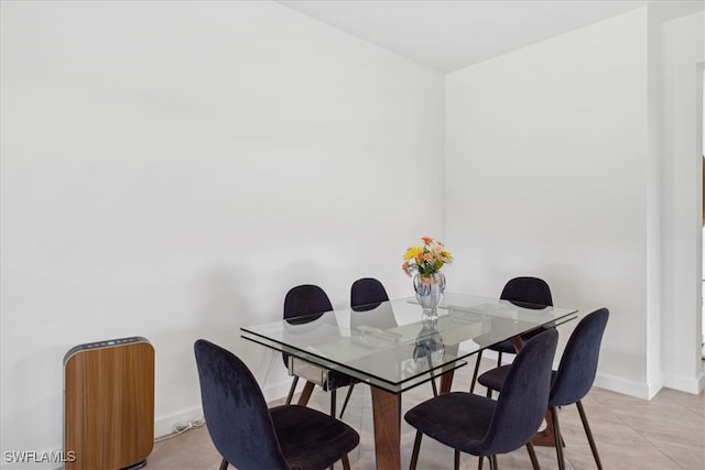 dining room featuring light tile patterned flooring