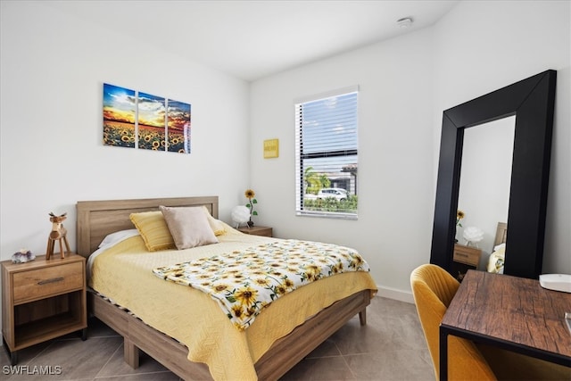 bedroom featuring tile patterned flooring