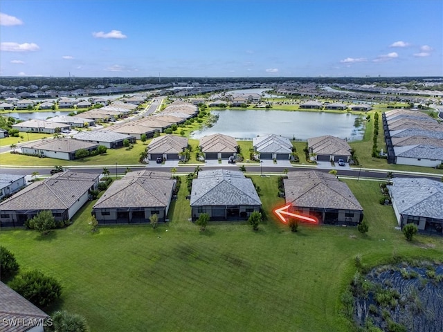 drone / aerial view featuring a water view