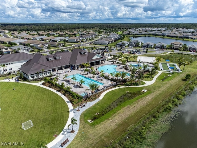 bird's eye view with a water view