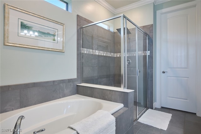 bathroom featuring tile patterned flooring, independent shower and bath, and ornamental molding