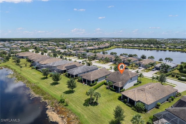 drone / aerial view featuring a water view