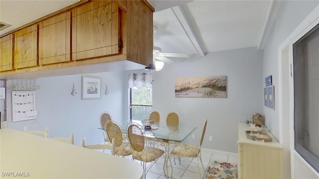 tiled dining room with vaulted ceiling with beams and ceiling fan