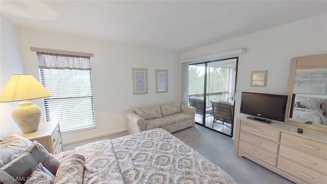 bedroom featuring multiple windows