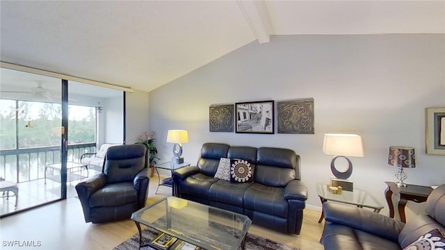 living room with light wood-type flooring and vaulted ceiling with beams