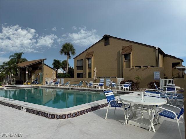 view of pool with a patio area