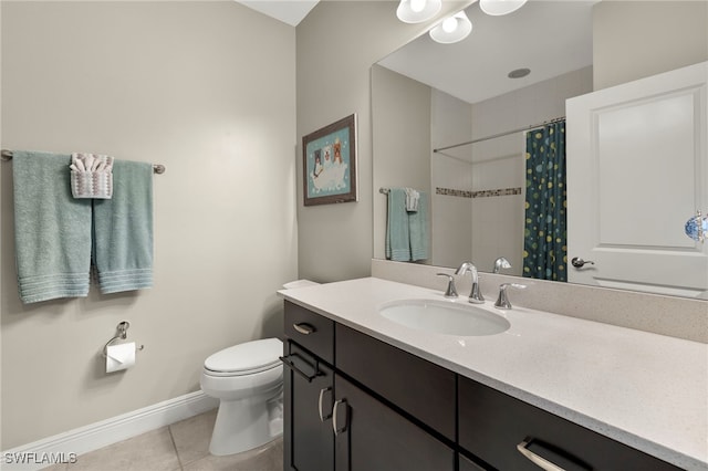 full bathroom with tile patterned flooring, curtained shower, baseboards, toilet, and vanity