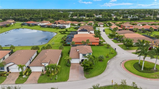 birds eye view of property featuring a residential view and a water view