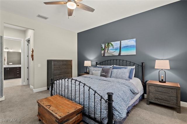 bedroom featuring light carpet and ceiling fan