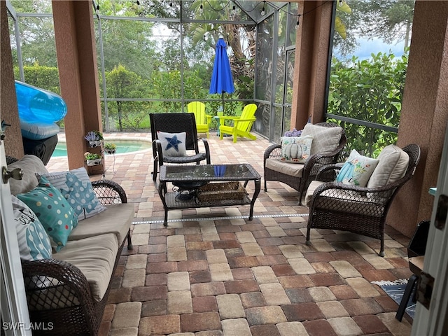 view of patio with a lanai and outdoor lounge area