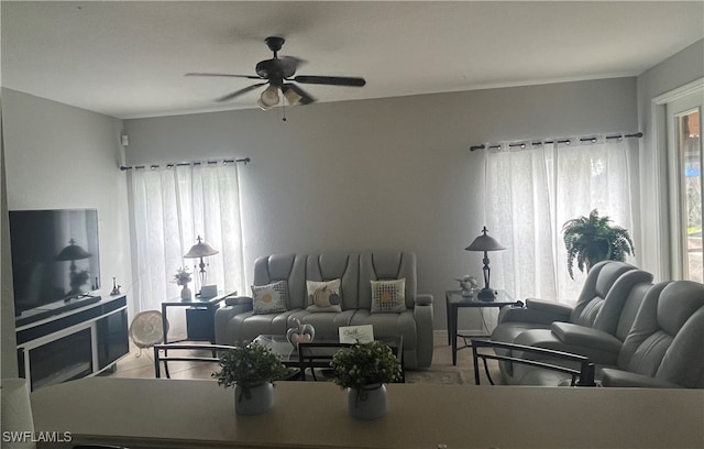 living room with ceiling fan