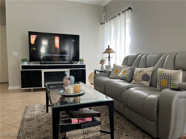 living room with tile patterned floors