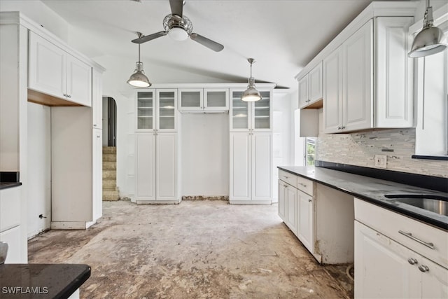 kitchen featuring pendant lighting, ceiling fan, and white cabinetry