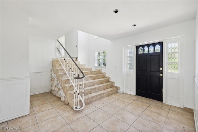 entrance foyer featuring light tile patterned floors