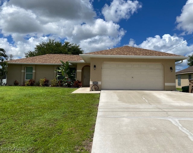 ranch-style home with a front lawn and a garage