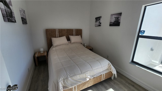 bedroom featuring hardwood / wood-style floors