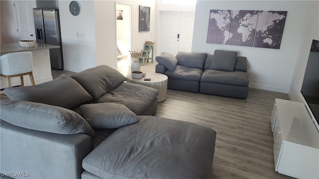 living room with light hardwood / wood-style floors