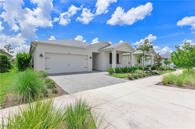 view of front of home with a garage