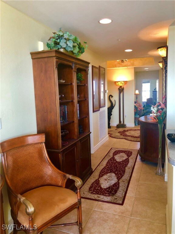 living area with light tile patterned flooring