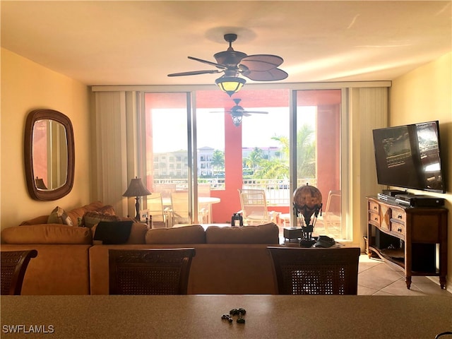 tiled living room featuring ceiling fan