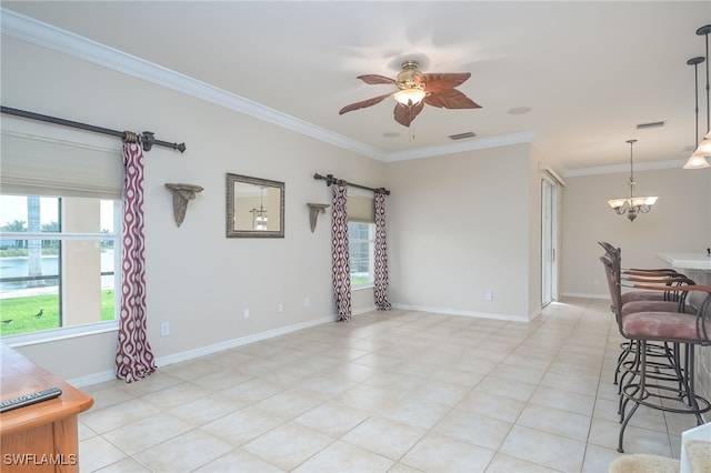 interior space with ceiling fan with notable chandelier and ornamental molding