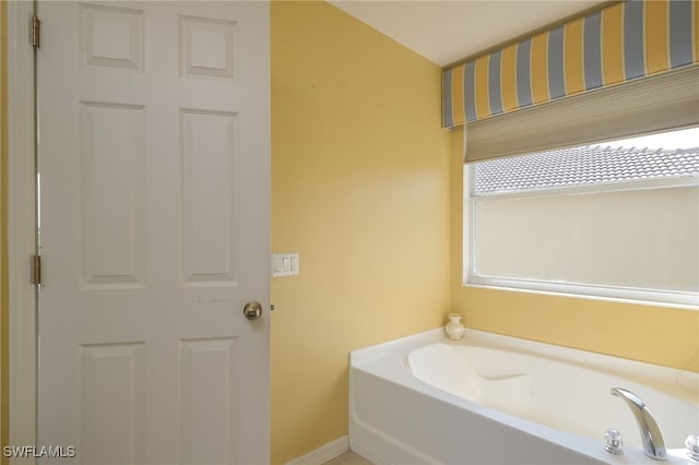 bathroom with a washtub